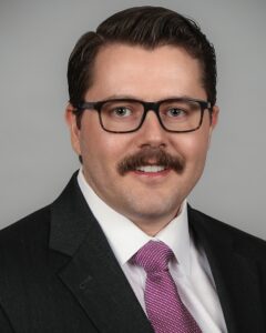 Grant M. Boland, J.D., LL.M., tax and estate planning partner at Boland Law Group